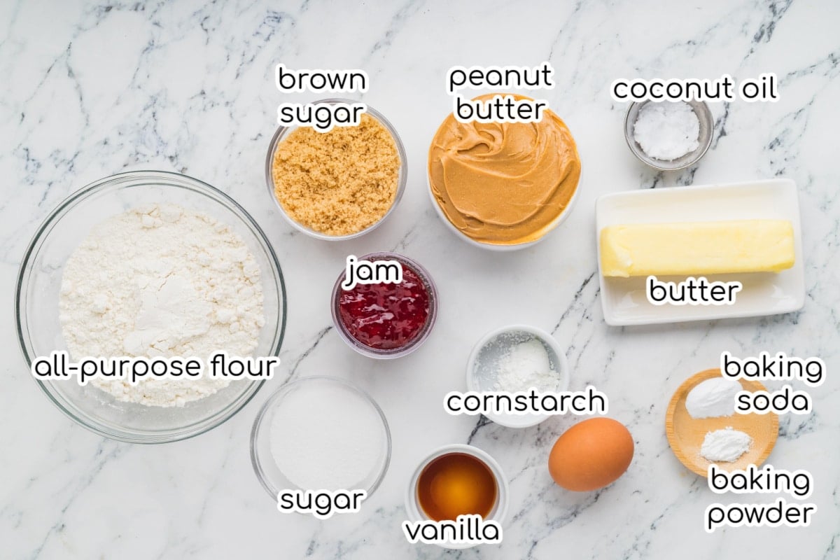Cookies ingredients on a marble table.