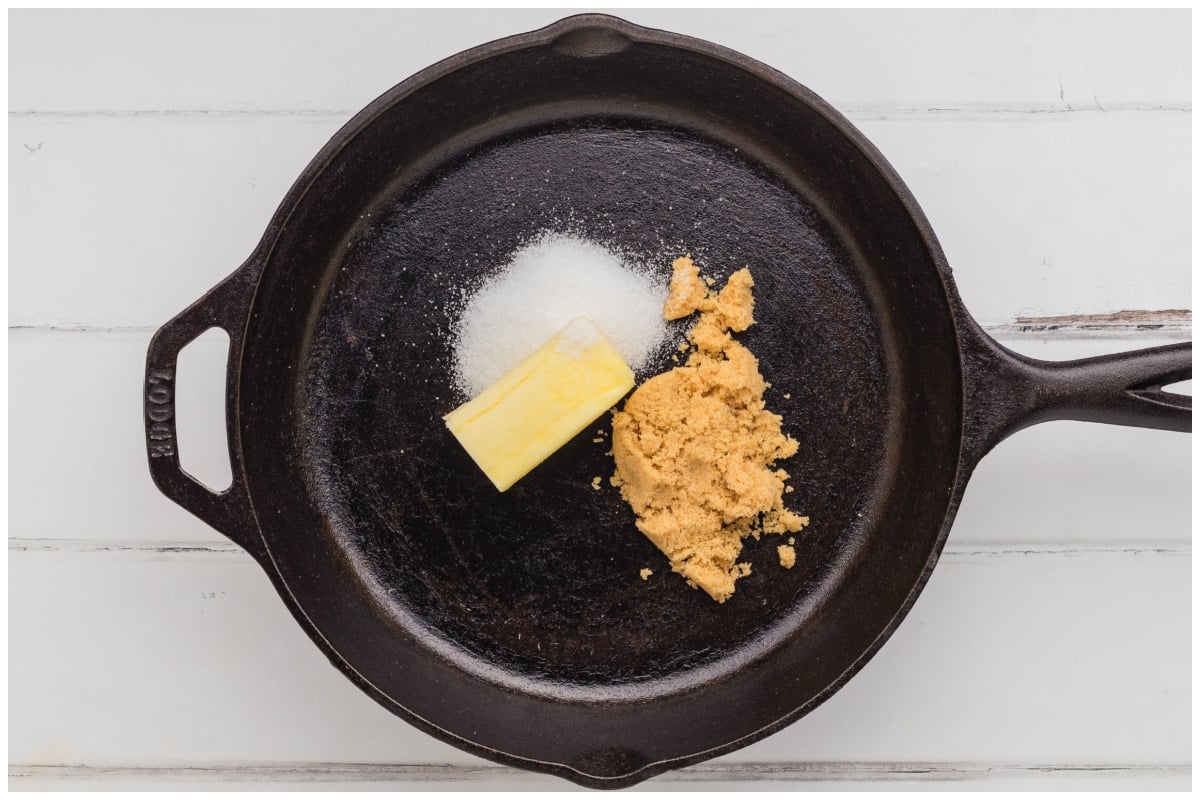 A skillet with butter and sugars.