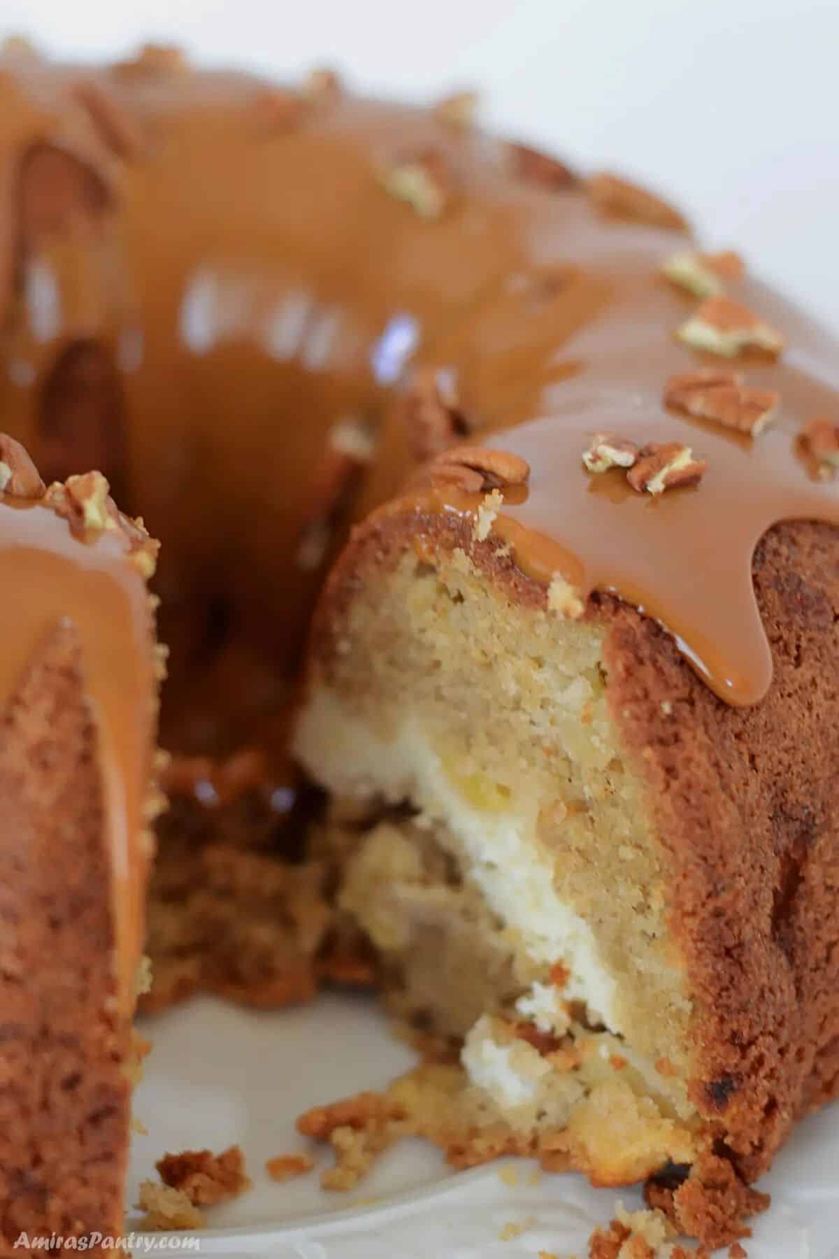 Apple bundt cake cut to show texture.