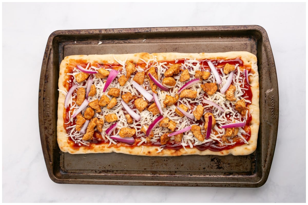 A flatbread pizza topped with all the ingredients.