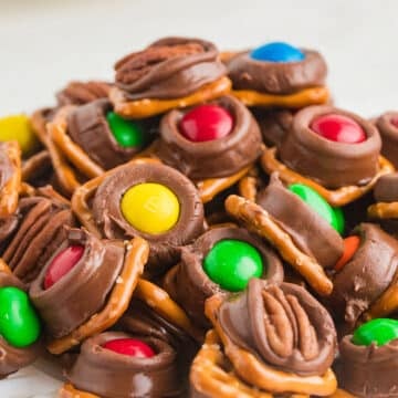 Rolo pretzel bites on a white surface.