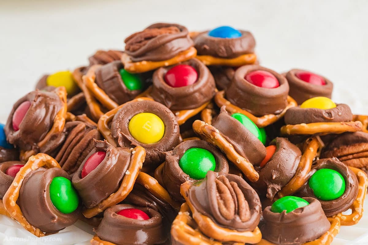 A stack of rolor pretzel bites on a white plate.