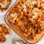 An overhead image of a glass casserole with pasta baked.