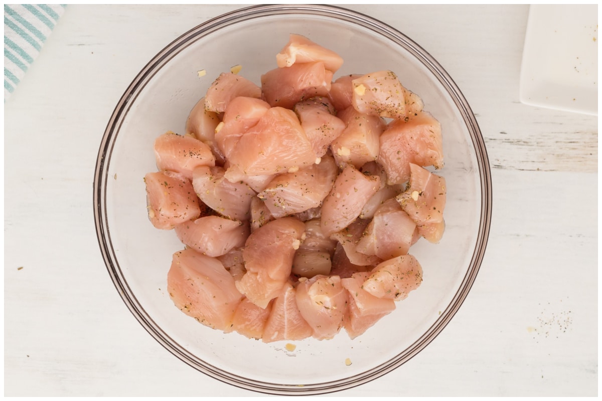 Chicken cubes in a large bowl.