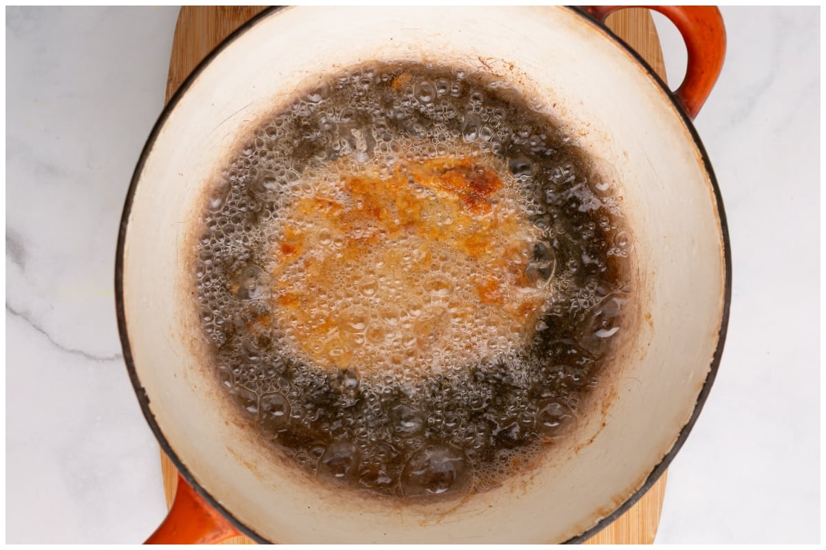 Frying steak in oil.