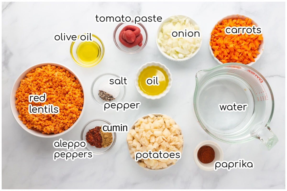 Soup ingredients on a marble surface.