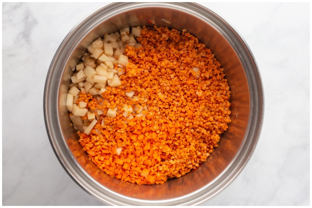 A pot with soup ingredients.