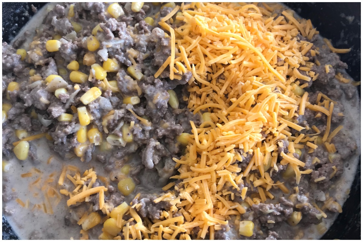 A cast iron skillet with the cowboy beef mixture.