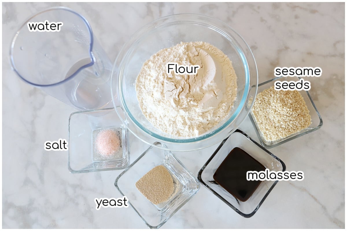 Simit ingredients placed on a white marble table.