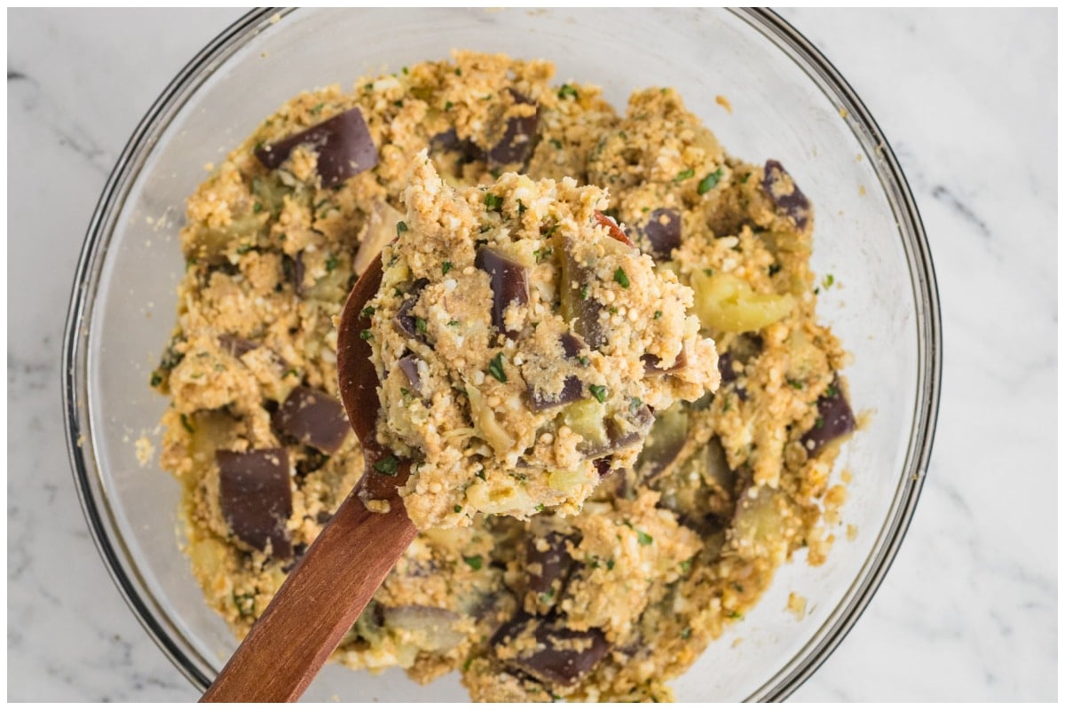 Meatballs ingredients mixed in a large bowl.