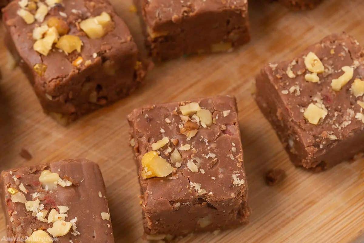 Fudge squares on a wooden board.