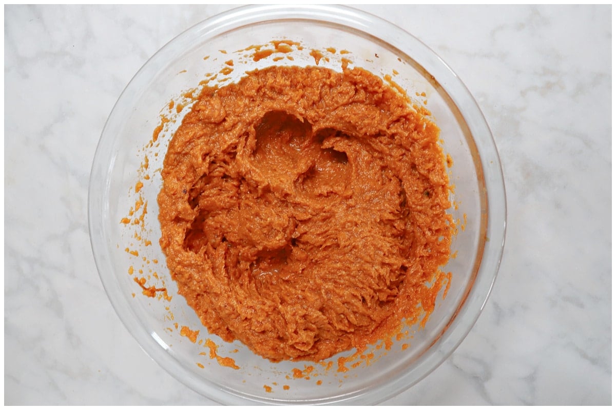 Glass bowl with fluffy whipped sweet potatoes.