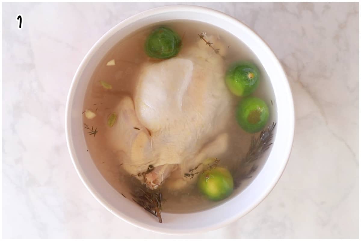A large bowl with brined chicken.
