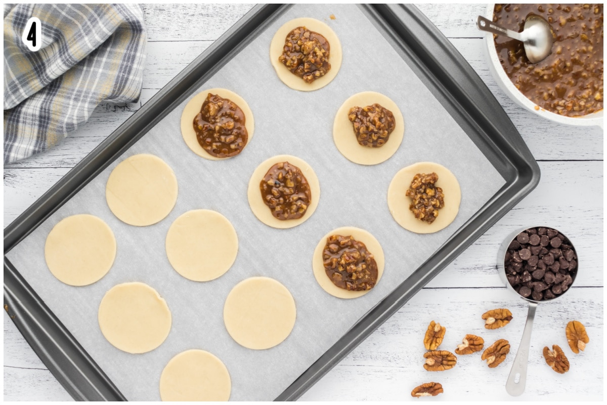 pie cricles on a cookie sheet lined with parchment paper.