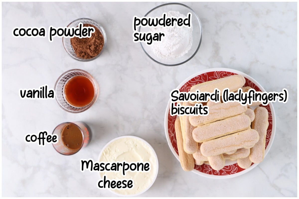 Ingredients for the tiramisu truffles on a marble surface.