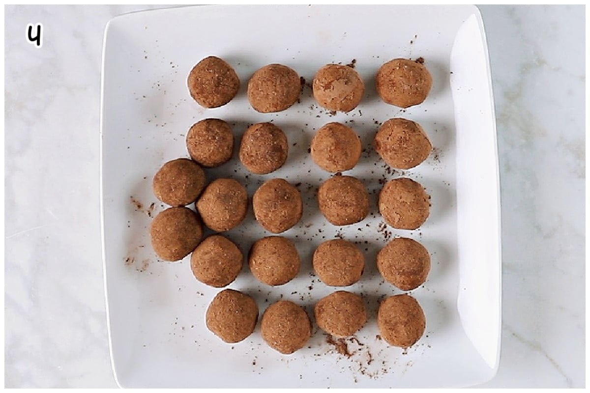 Dusted tiramisu truffles on a serving platter.