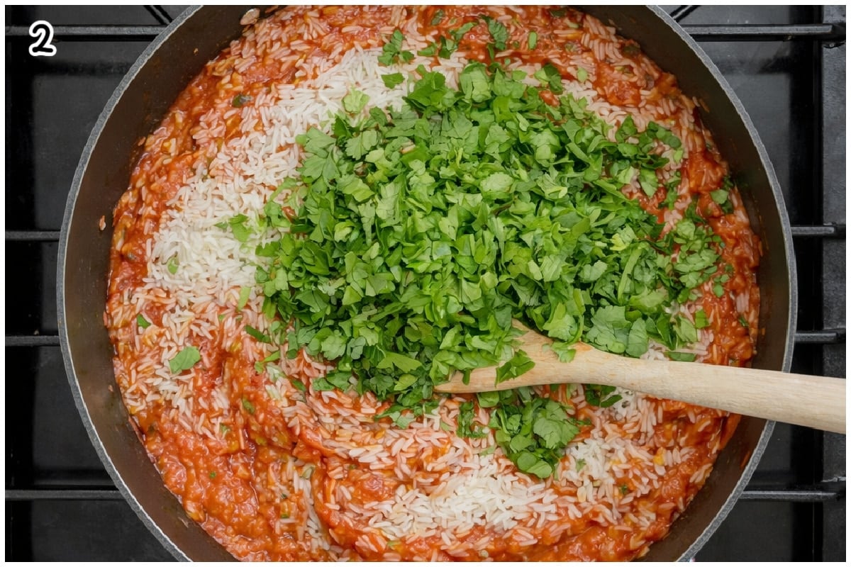 Cabbage rolls rice stuffing in a large skillet.