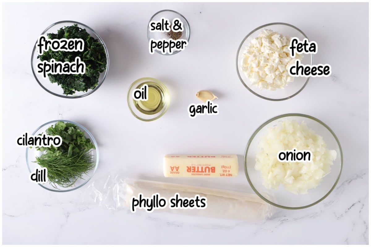 Ingredients for the spanakopita recipe with text overlay.