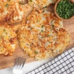 Potato Rosti stack on a wooden board.