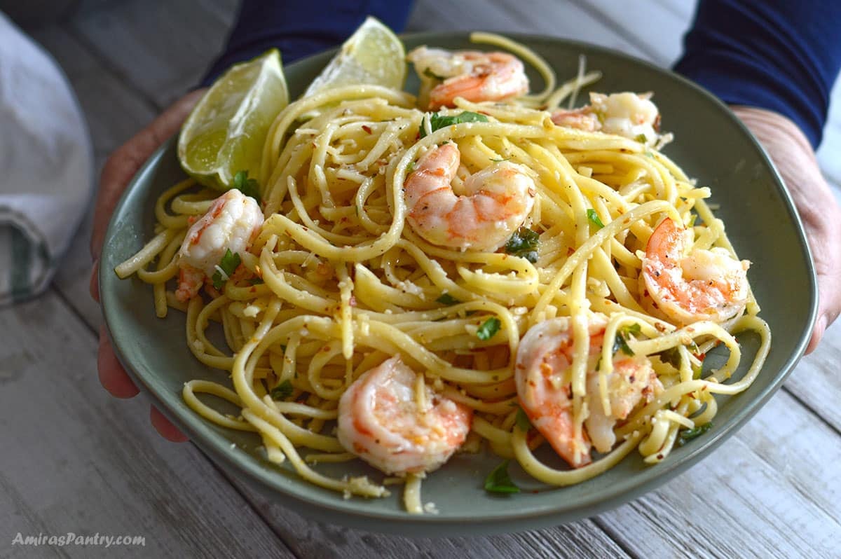 A generous serving of Shrimp Scampi with succulent shrimp nestled throughout linguine pasta.